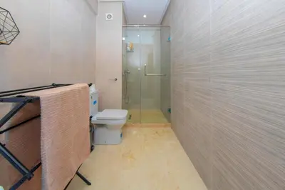 a bathroom with a shower and a toilet at New apartment with pool in Marrakech
