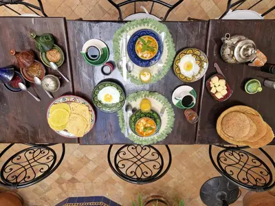 an overhead view of a table full of food at Riad Rose Jade Marrakech in Marrakech