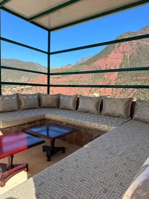 a couch in a room with a view of the grand canyon at villa ourika in Marrakech