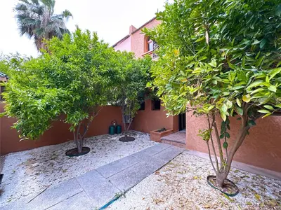 a group of trees in front of a building at New! Duplex Annakhil , Calme et proximité centre in Marrakech
