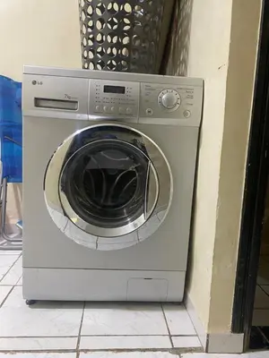 a washing machine sitting next to a wall at Riad zineb au cœur de Marrakech &3 Piscines &Jacuzzi & Petit-Déjeuner& parking gratuit in Marrakech
