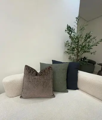 a white couch with pillows on top of it at Prestige cocon in Marrakech