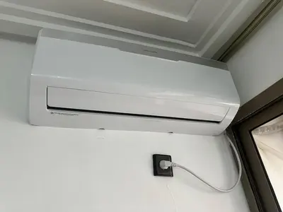 a white object is hanging from a ceiling at Modern Apartment in Great Location of Marrakesh in Marrakech