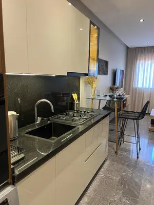 a kitchen with a sink and a counter top at cozy apartment in Marrakesh in Marrakech