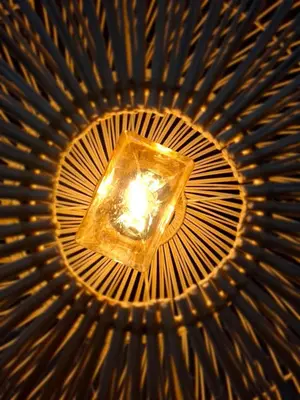 a light in the middle of a ceiling at Riad Dar el Hachmia - Central private Riad, Air cond, heated pool and Hammam in Marrakech