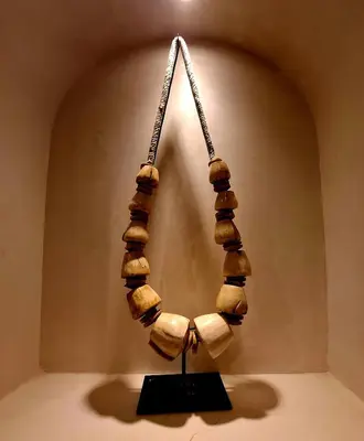a exhibit in a museum with a bunch of wooden beads at Riad Dar el Hachmia - Central private Riad, Air cond, heated pool and Hammam in Marrakech