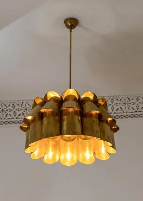 a chandelier hanging from a ceiling at Riad Olma in Marrakech
