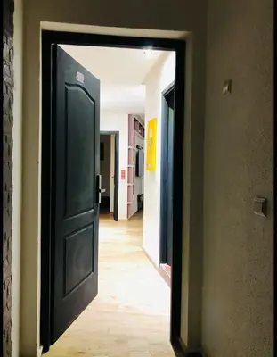a hallway with an open door in a room at Apartment Marrakech in Marrakech