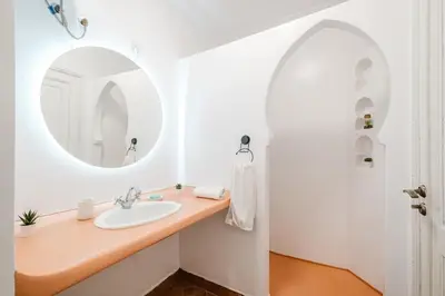 a bathroom with a sink and a mirror at Cozy Studio Well Located Near Gueliz in Marrakech