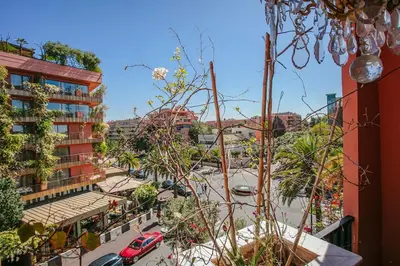 a view of a street in a city with buildings at Maison Elysium Hivernage Marrakech in Marrakech