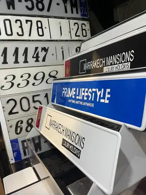a bunch of signs in a store at Spacious Vibrant Apartment Marrakech Central - Prime Lifestyle Group in Marrakech