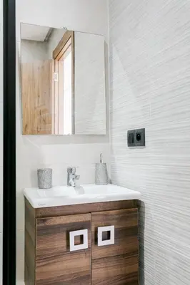 a bathroom with a sink and a mirror at Suite Art déco Piscine privée in Marrakech