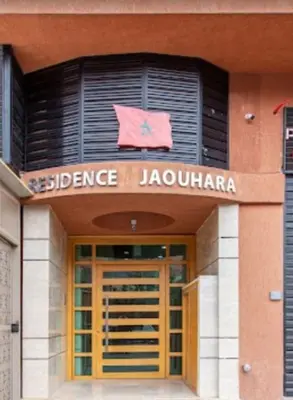 a sign over the entrance to a jacobean building at Migdal Jaouhara in Marrakech