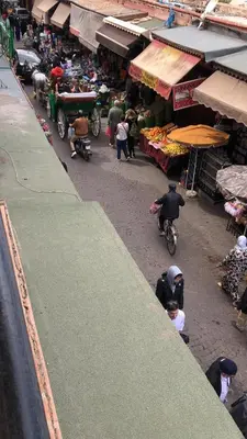 an overhead view of a market with people in a street at Dar DAROUNE in Marrakech