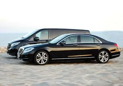 two cars parked next to each other on a beach at Car in Marrakech