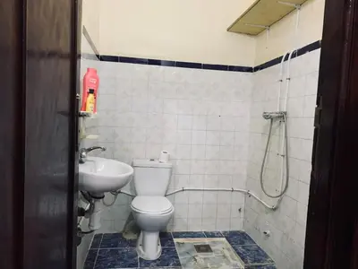 a bathroom with a toilet and a sink at 120m2, Centre Marrakech, Traditional in Marrakech