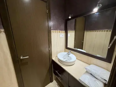 a bathroom with a sink and a mirror at Prestigious Villa in Marrakesh in Marrakech