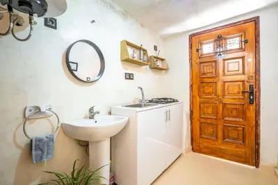 a bathroom with a sink and a mirror at dar dmana in Marrakech
