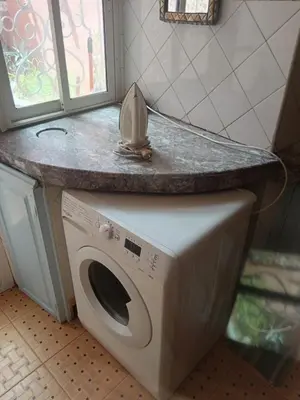 a washing machine with a counter on top of it at Les 3 SOEURS MAJORELLE in Marrakech
