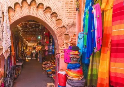 a market with a bunch of different colored shops at Walili 1 in Marrakech