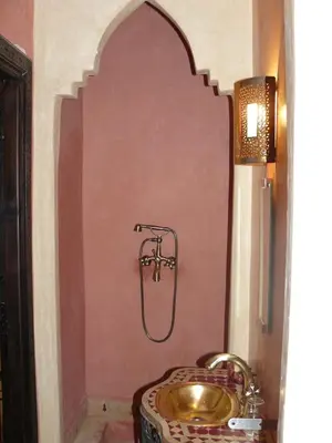 a bathroom with a sink and a shower at Riad Marrakech - Piscine -Wifi- résidence qarya essyahia in Marrakech