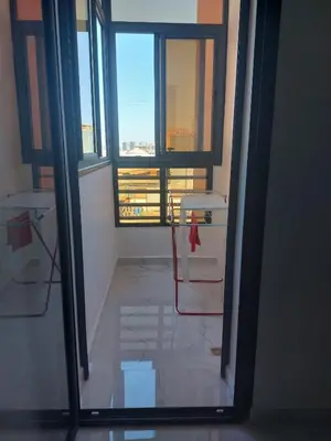 a view through a glass door of a room with a window at Marrakech Riad in Marrakech