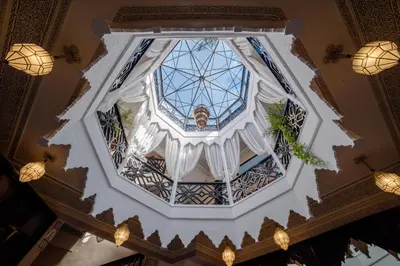an overhead view of a building with a glass ceiling at Riad El Wiam in Marrakech