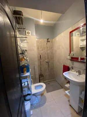 a bathroom with a shower and a toilet and a sink at Marrakech Gateway in Oulad Akkou