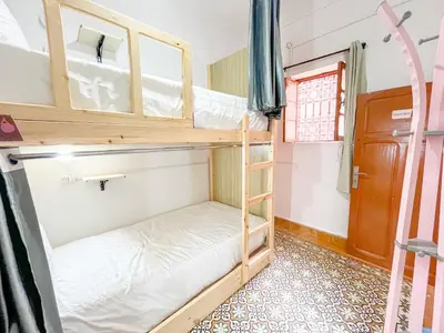 a room with bunk beds in a dorm room at Bubbly Hostel Marrakech in Marrakech