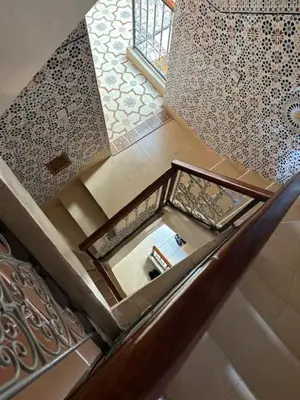 an overhead view of a staircase in a house at Charming Private Riad in Marrakech