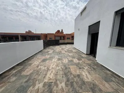 a view of an empty balcony of a building at Splendide dernier étage plein coeur de Guéliz et Carré Eden in Marrakech