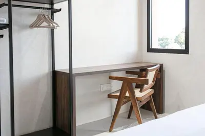 a desk in a room with a chair and a window at The view City Center in Marrakech