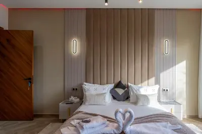 a bedroom with a bed with two hearts on it at Villa Mareva & Spa Marrakech in Marrakech