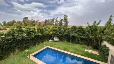 an aerial view of a backyard with a swimming pool at Private Villa with Pool in Marrakech