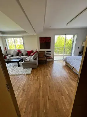 a living room with a couch and a bed at Private Villa with Pool in Marrakech