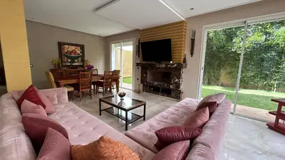 a living room with a large couch and a table at Private Villa with Pool in Marrakech