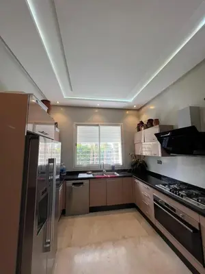 a kitchen with stainless steel appliances and a window at Private Villa with Pool in Marrakech