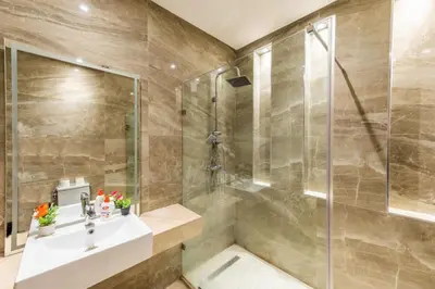 a bathroom with a sink and a shower at Villa 3 in Marrakech