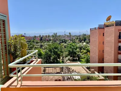 a balcony with a view of a city at Sublime 2 bedroom apartment in Marrakech in Marrakech