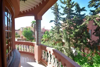 a balcony with a view of a yard at Villa Marrakech in Marrakech