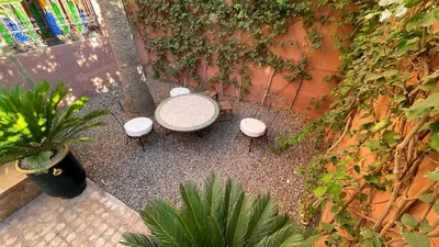 an overhead view of a patio with a table and chairs at Villa Marrakech in Marrakech