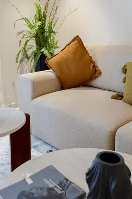 a living room with a couch and a table at L'ambiance de Marrakech Luxe in Marrakech