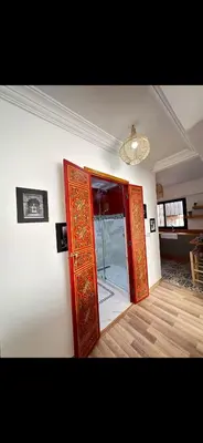 a room with an open door in a room at Rouge Mamounia in Marrakech