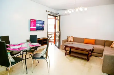a living room with a couch and a table at Luxury Odyssey Private Pool in Marrakech