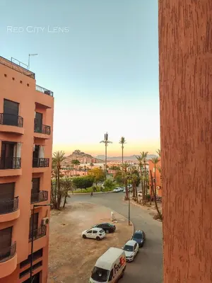 a view of a parking lot from a building at Eden Orientale in Marrakech