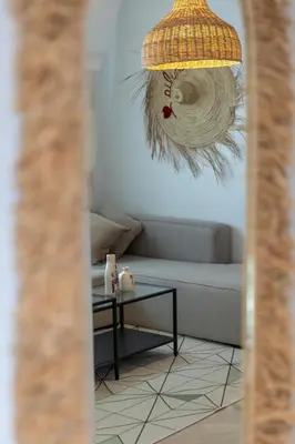 a living room with a couch and a table at Modern & Chic Apartment in Gueliz, Marrakech in Marrakech