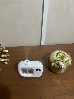 a camera and a helmet on a table at Luxury Apartment Near Airport & Medina in Marrakech