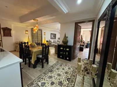 a kitchen and dining room with a table and chairs at Central Fiber Optic Pool in Marrakech