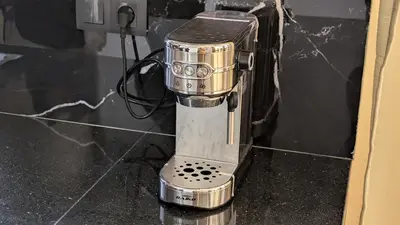 a silver appliance sitting on top of a counter at Stylish Apart Near City Center in Marrakech