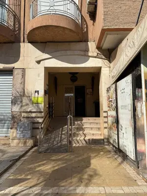 an entrance to a building with a metal gate at Modern studio near the center in Marrakech